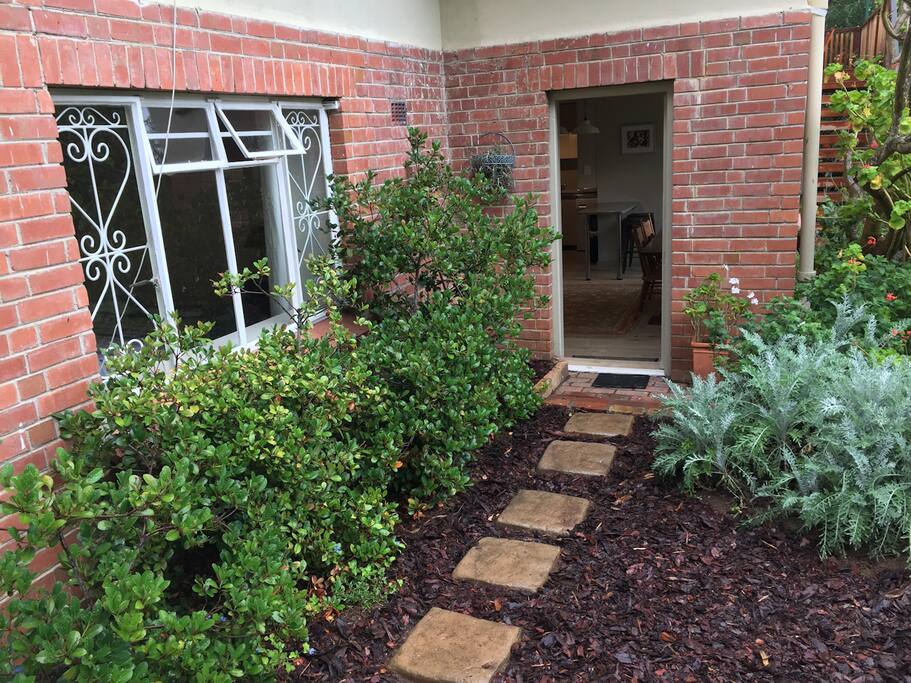 Separate entrance to garden flat below our house