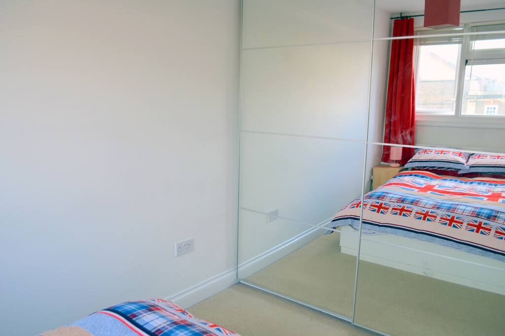 Mirrored wardrobe storage