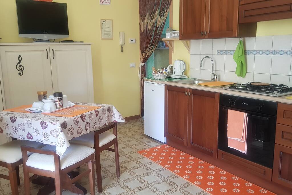 soggiorno angolo cottura