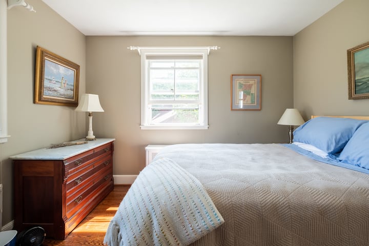 Bedroom # 2 looking out to the carriage house, chickens and fields. 