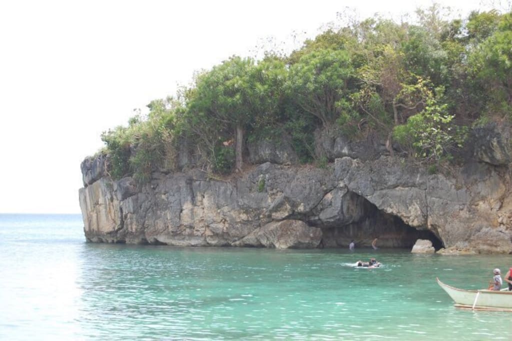 Cave in while you enjoy the pristine waters of Kwebang Lampas