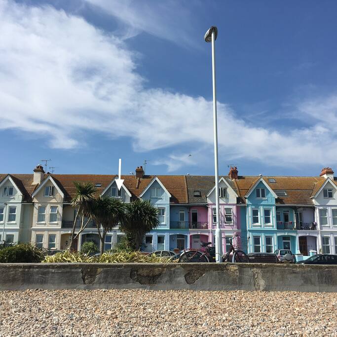 Arrow shows bedroom window from the beach