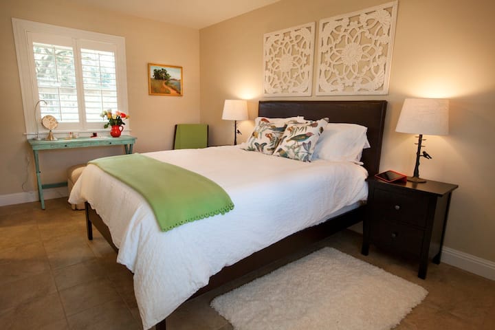 The Guest Cottage bedroom has a pillow-top Queen bed, 400-thread count cotton sheets, plush blanket, seasonal weight duvets and your choice of memory foam and down-alternative pillows.