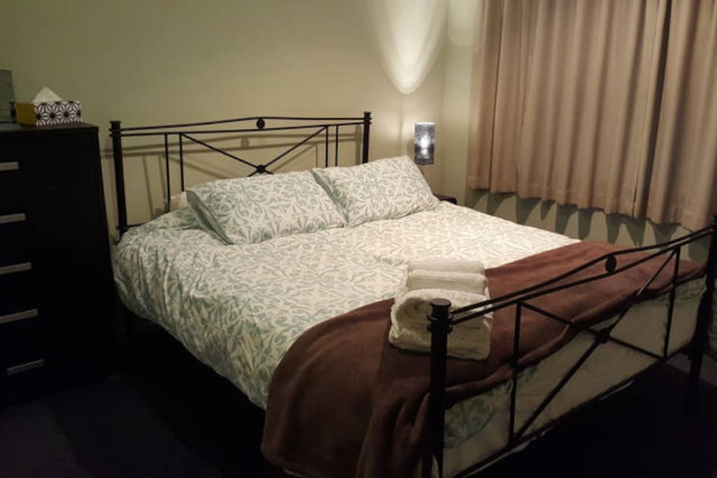 Bedroom 1: Comfy king bed with all bedding and towels