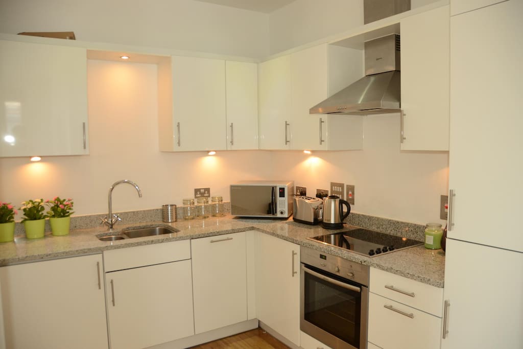 Modern Kitchen, with washer dryer, dishwasher, microwave etc.