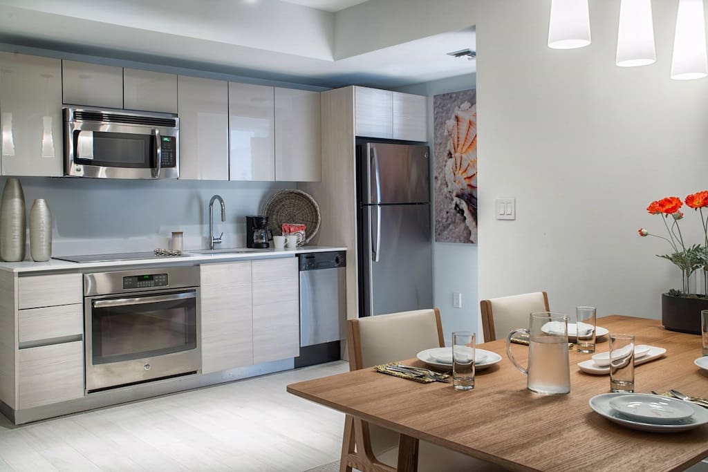 Prepare delicious meals in the beautiful kitchen complete with stainless steel appliances.