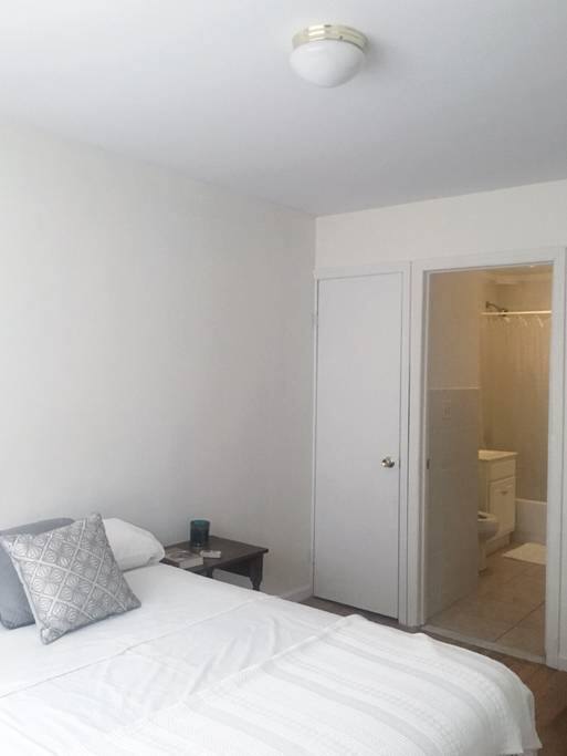 Full size bed in private roomy space with closet attached bathroom.