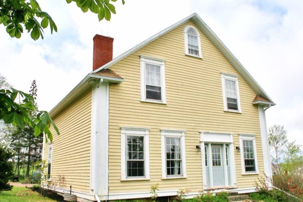 Front face of the home, wonderful natural light and beautiful historic exterior.