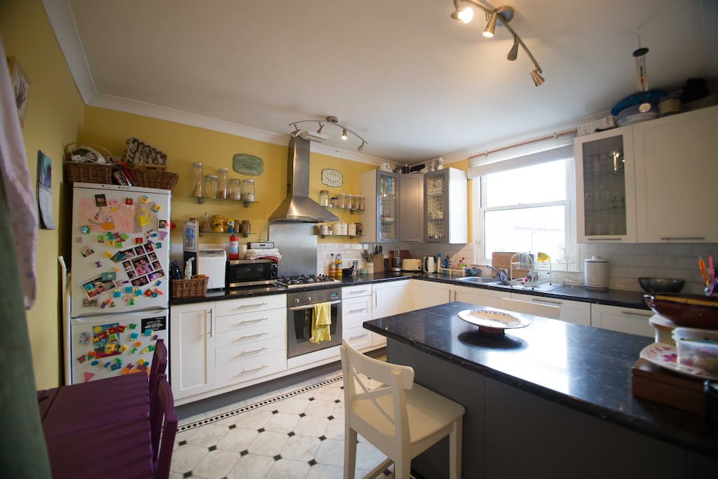 Lovely eat in kitchen, beautiful light in the morning. Washer, dishwasher, microwave and all the usuals - pots, pans etc