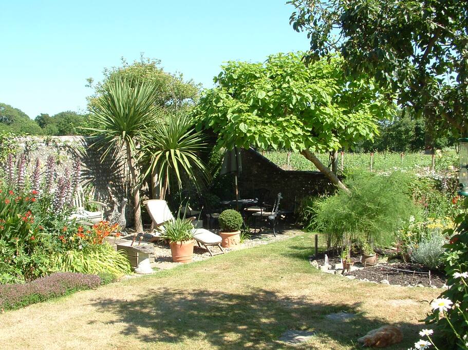 Crockfords rear garden and view over Tinwood Vineyard