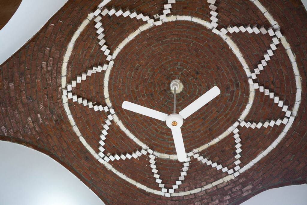 Beautifully decorated ceiling with fan