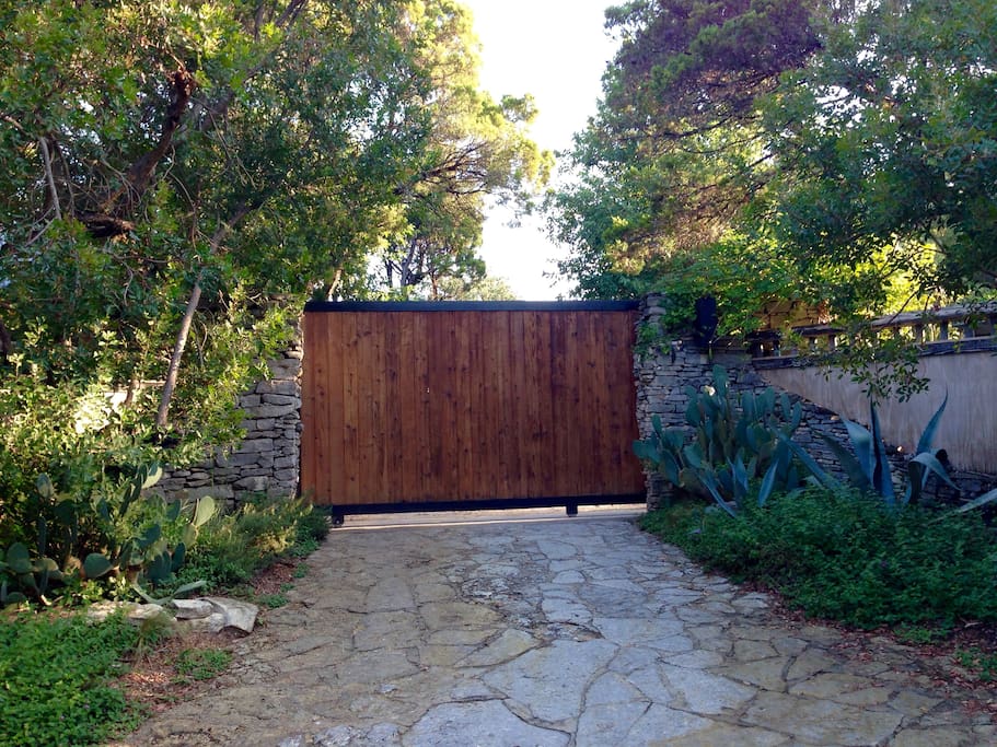 Here's the entrance gate to our place - "Town & Country" - once inside, you'll see your Country Vineyard Cabin to the left. You will have the use of a gate remote control during your stay.