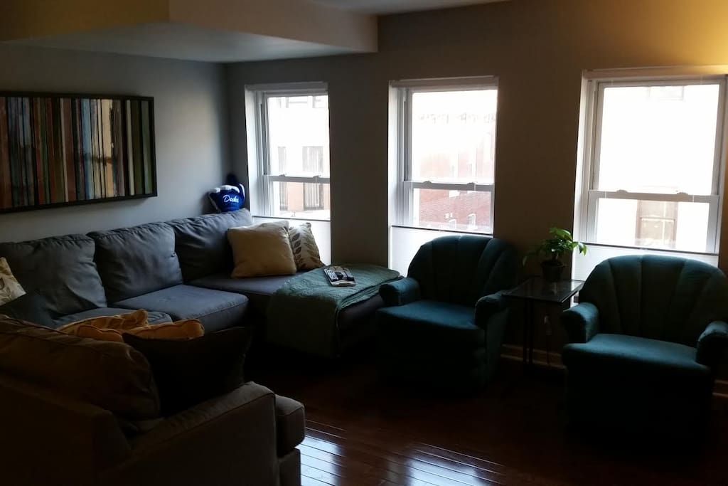 Living Room with large sectional and two chairs