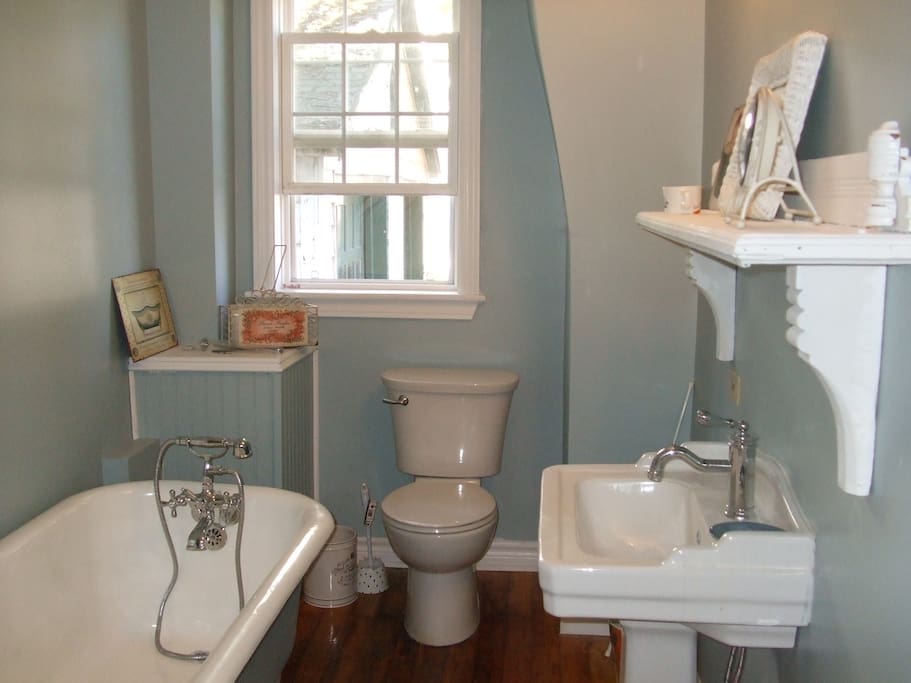 shared lower bathroom with antique clawfoot tub