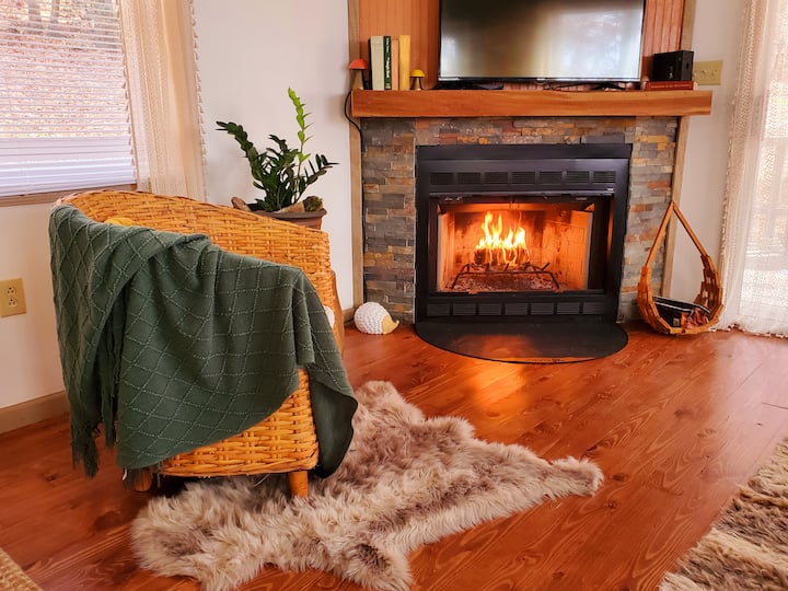 Cozy up around a gorgeous indoor fireplace. Indoor fire logs provided for ease of use. 