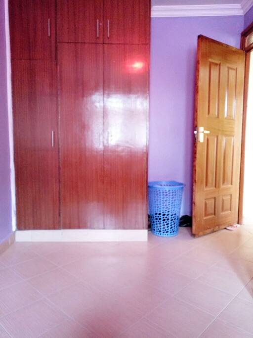 Spacious wardrobe and laundry basket