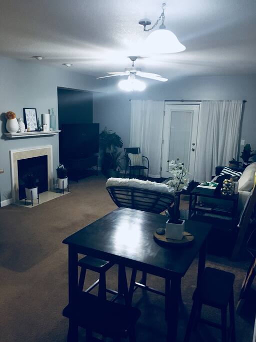 Livingroom with fireplace & patio access