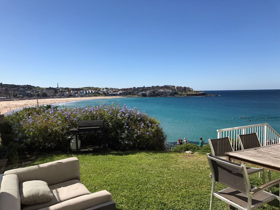 Garden overlooking Bondi Beach with BBQ, dining table and lounge (shared with neighbour)