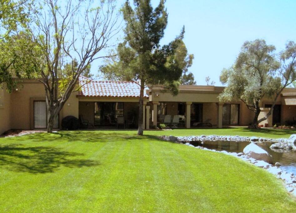 Patios with views of pond with water feature.