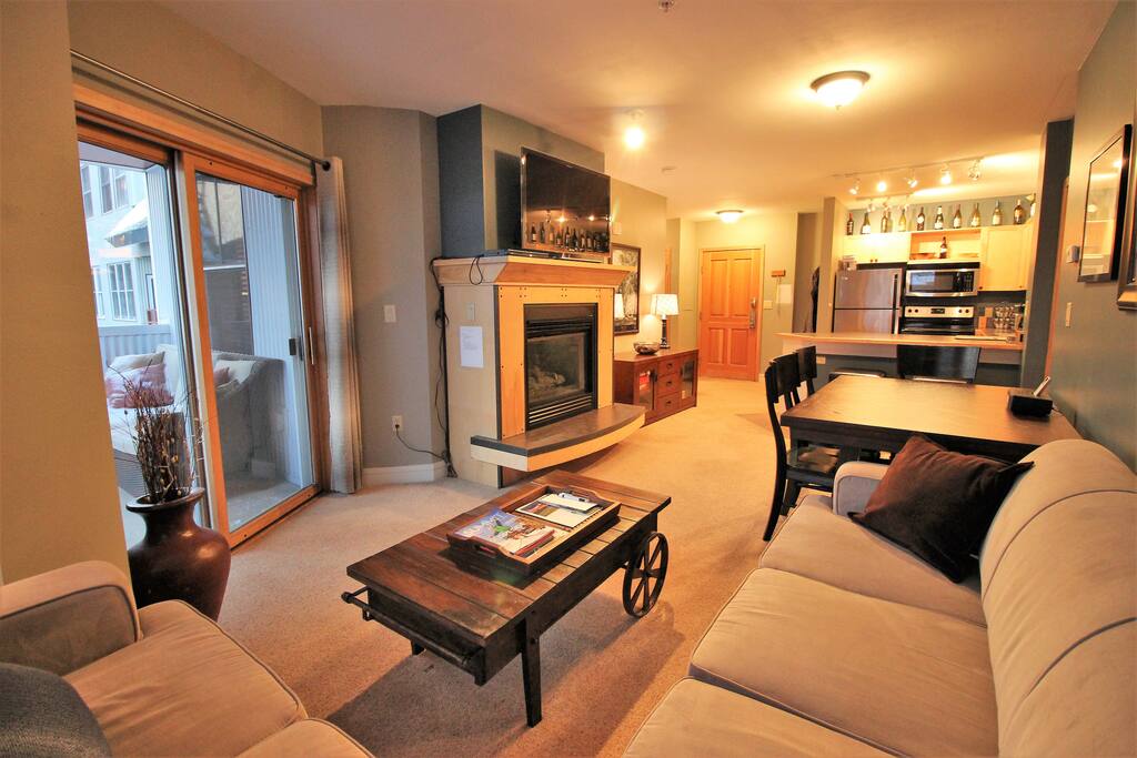 Sleeper sectional with memory foam pullout, and a flat screen TV with HD cable/DVD player.