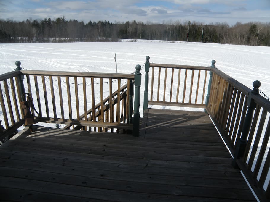 Deck overlooking the back field.