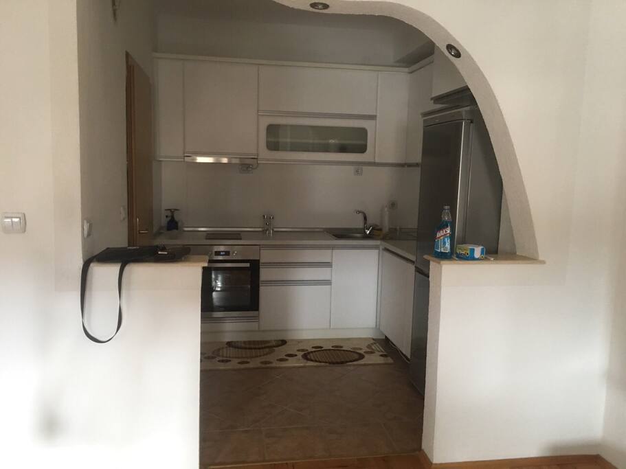 Kitchen connected to the living room.