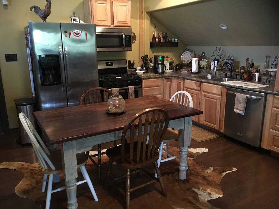 Full kitchen with new appliances, cookware, dishes, utensils, glasses...everything you need!.
