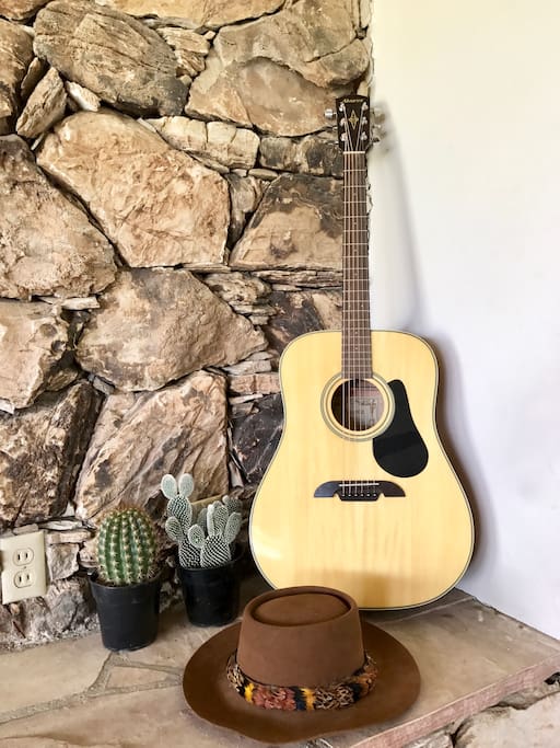 One of many guitars are found throughout the Coachella house.