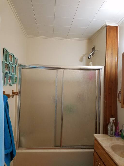 bathtub with glass door