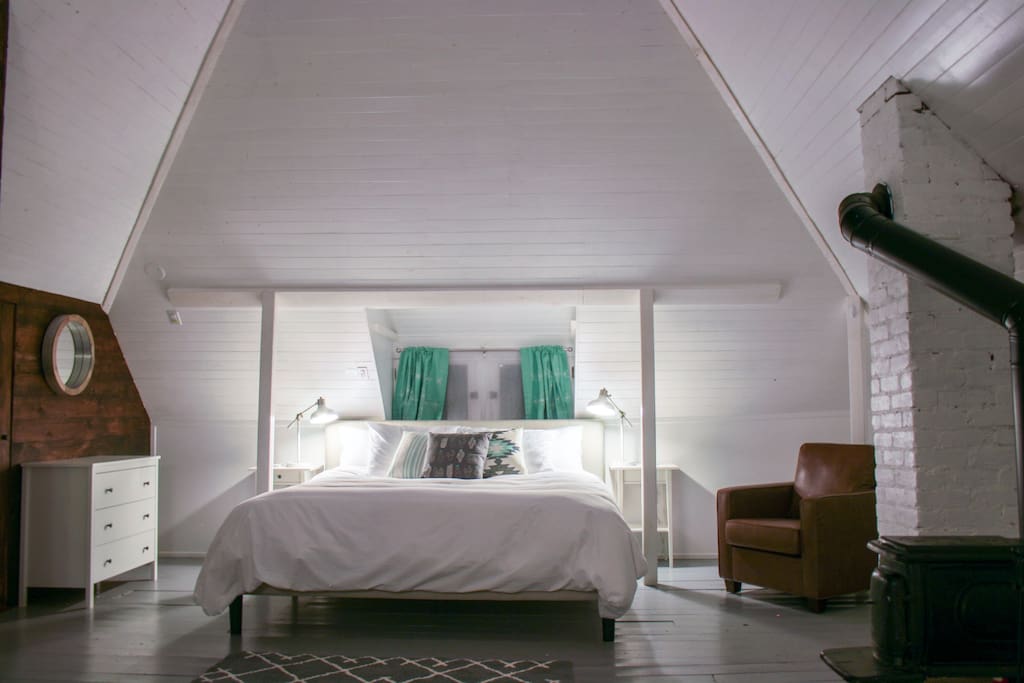 House #1, Bedroom #2 - King size memory foam bed in renovated attic with wood burning stove.