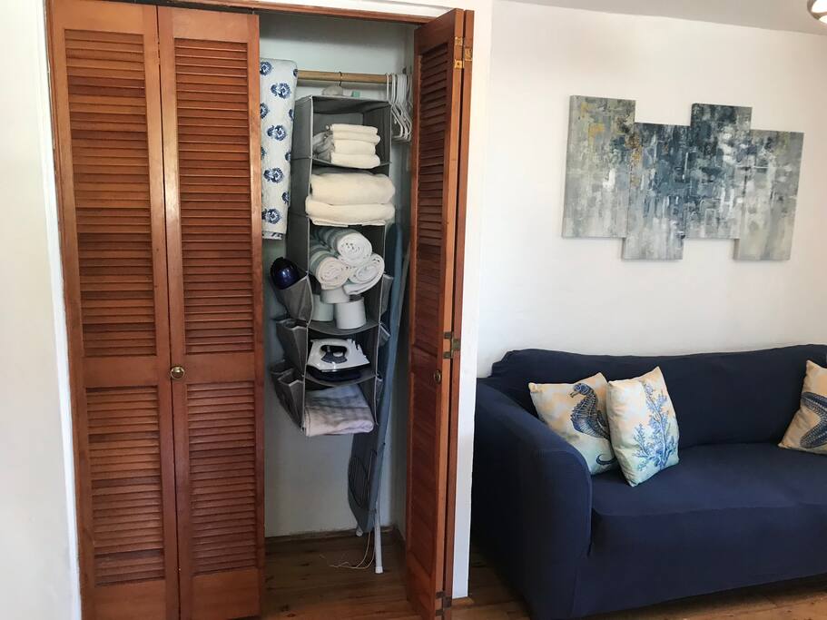 Both personal and beach towels hairdryer, iron and ironing board