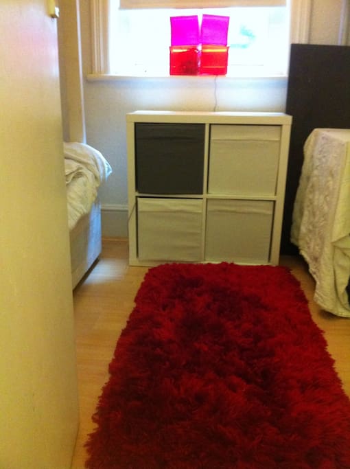 Smaller Bedroom for up to 4 people. Left normal double bed. Wooden double loft bed above.