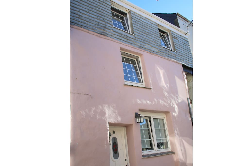 The house is a former fisherman's cottage tucked into a narrow street