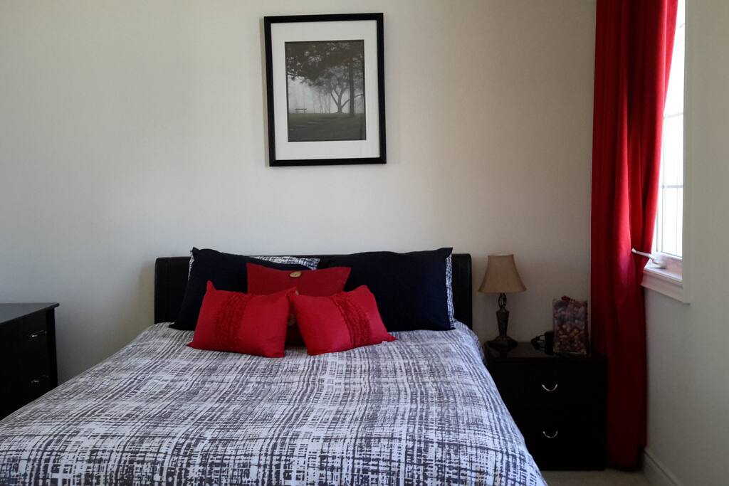 12 foot ceiling in bedroom with a closet and attached bathroom for your private use