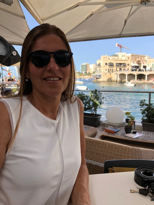 Karen the host at balluta bay just 3 minutes away from apartment at Naar restaurant situated on the water’s edge