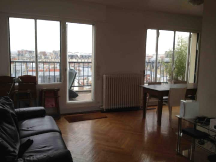 Living room - view on Paris rooftops