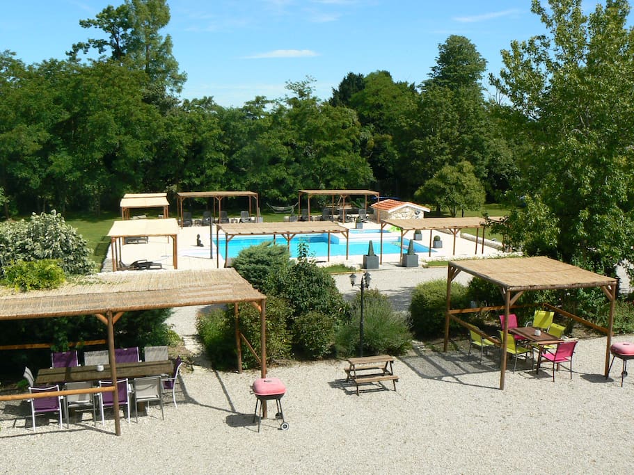 View of pool and outdoor dining area