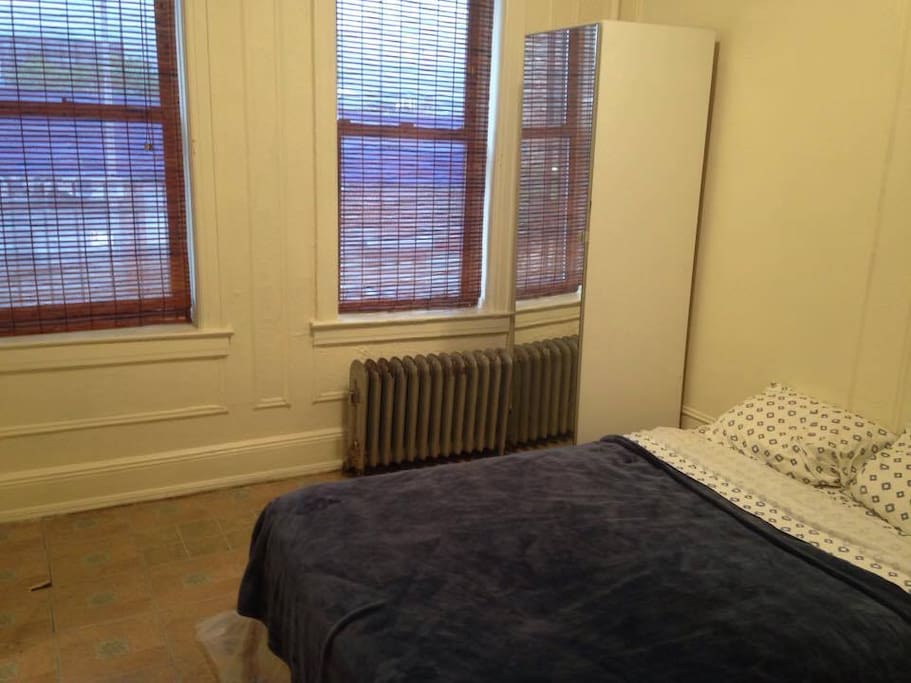 Bedroom with mirrored closet