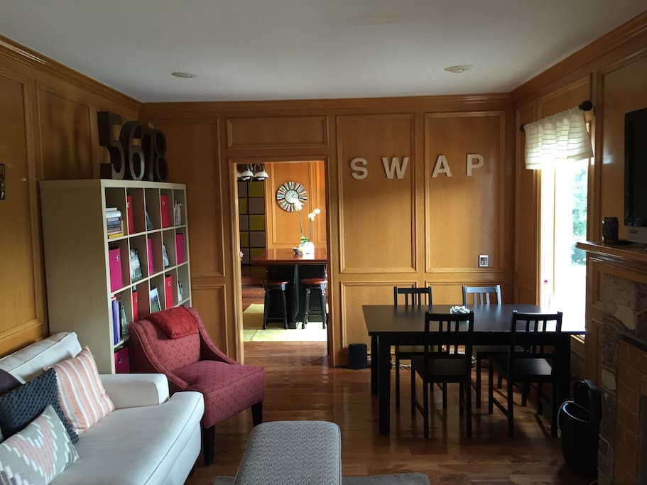 Our living room that has Apple TV, a ton of great books, and blazing fast internet!