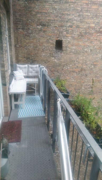 Balcony facing small quiet courtyard. Access from master bedrom. No noise.