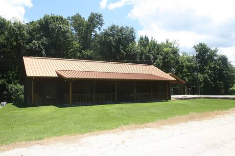 West Sandy Creek Winery Creekside Log Cabin