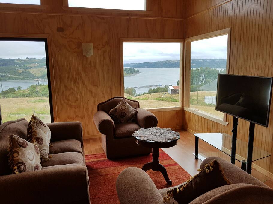 sala de estar y vista a la bahía