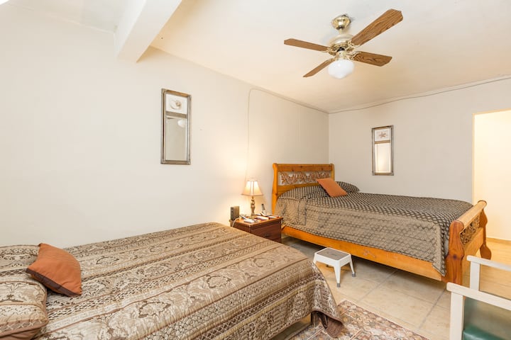 Bedroom is very private. Two queen size beds, AC/Heating unit, ceiling fan and smart tv. 