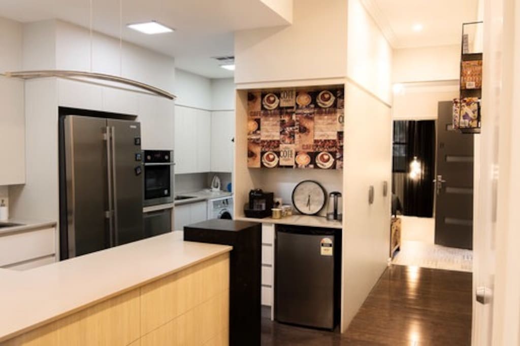 Fully equipped for self catering. The ground floor kitchen has microwave, electric oven, induction cooktop, dishwasher, fridge & freezer and front load washing machine.