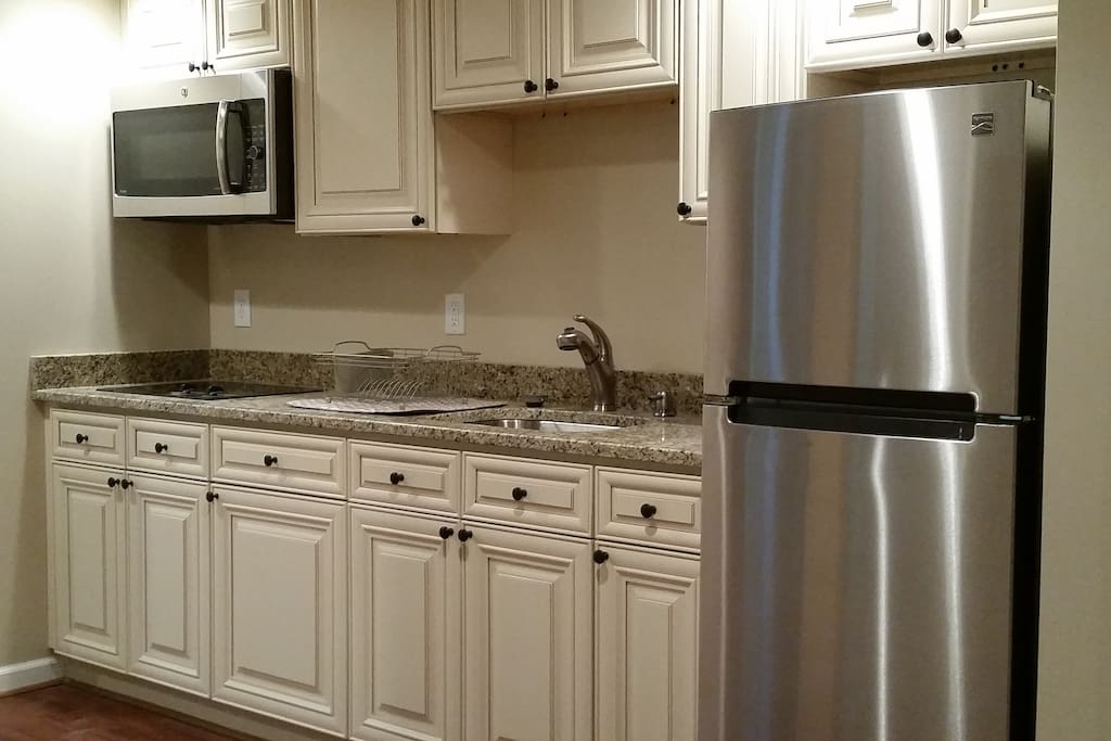 Microwave and convection oven in one. Plus two electric burners.