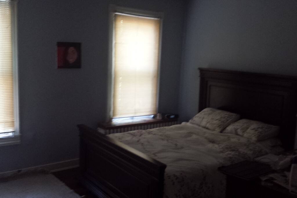 Queen bed in the front bedroom