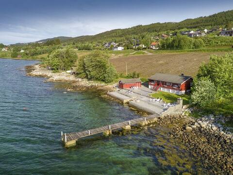Beach cabin next to the fjord.