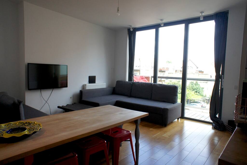 Here's your living room with two double sofa beds