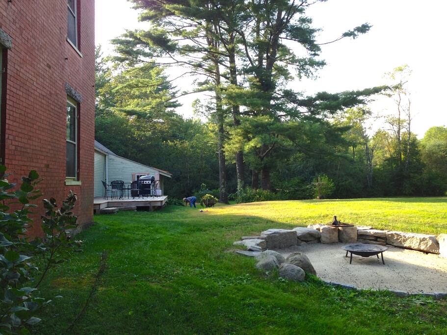 Fire pit, deck and back yard.