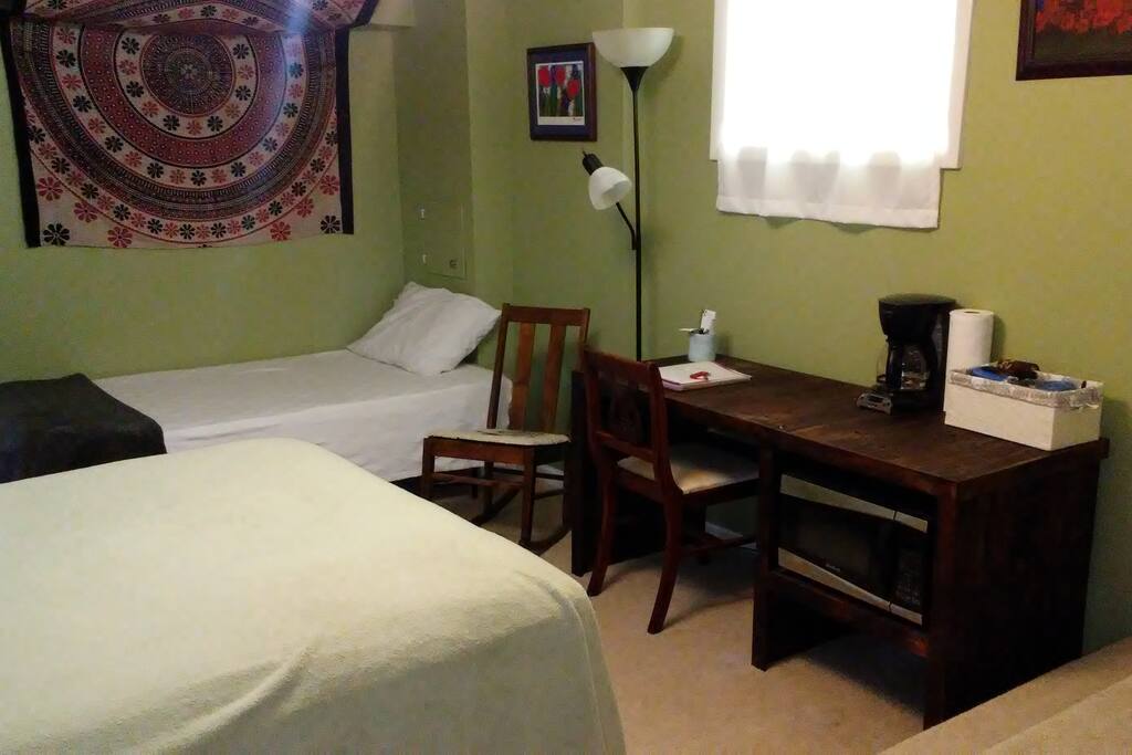 2nd bed (twin, if needed). Desk in bedroom with coffee maker and microwave.